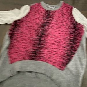 A fancy pink,gray, and black going out sweater.